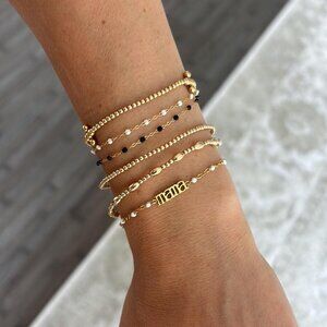 The Jane Dainty gold & white MAMA beaded look adjustable bracelet